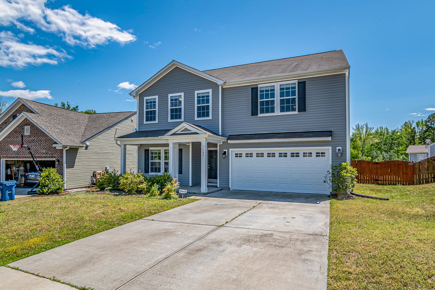 Suburban house with a concrete driveway